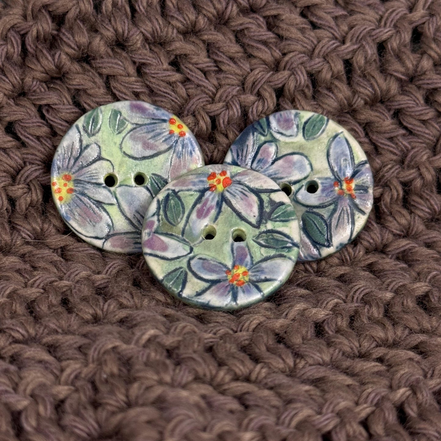 Purple Flowers on Green Round Buttons