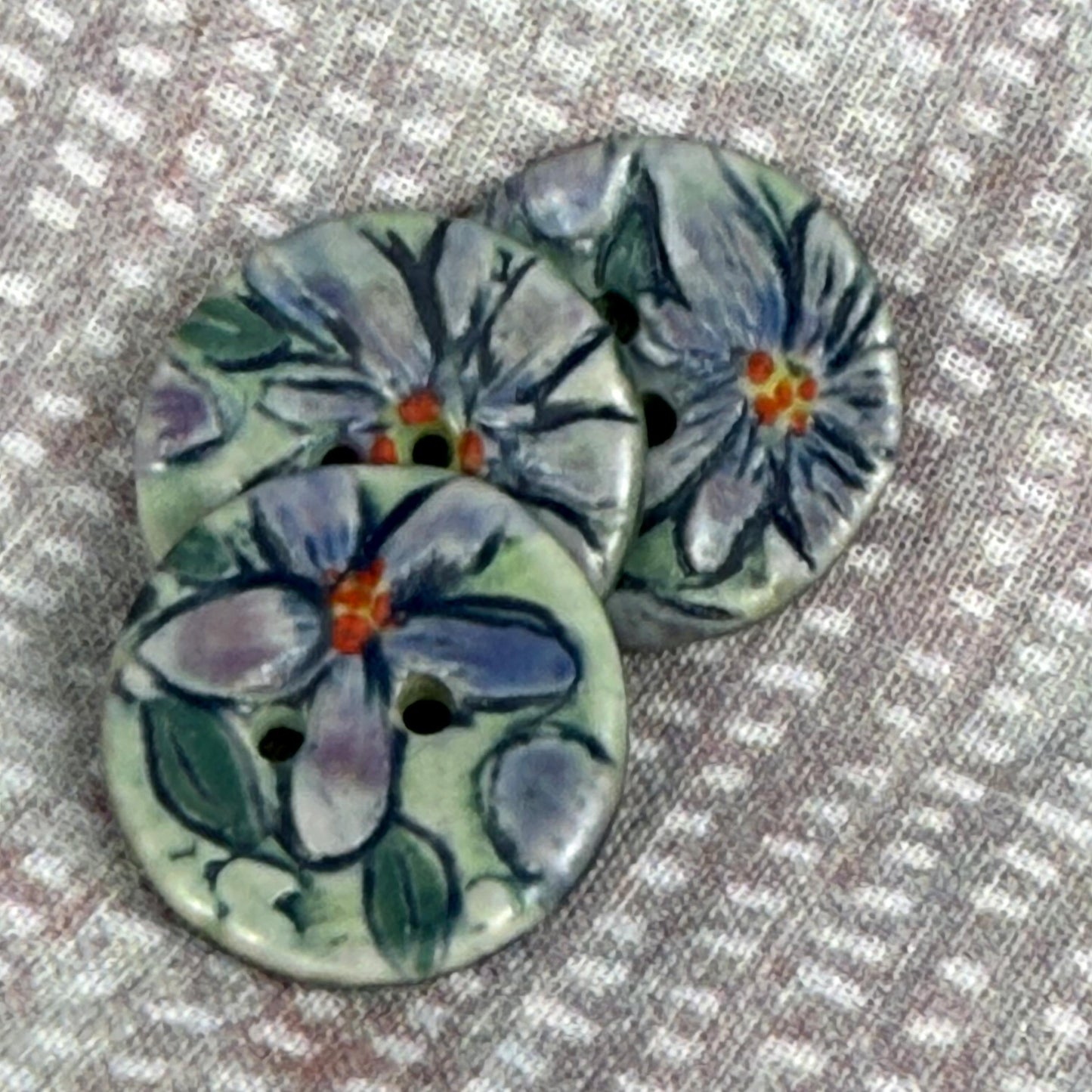 Small Purple Flowers on Green Round Buttons