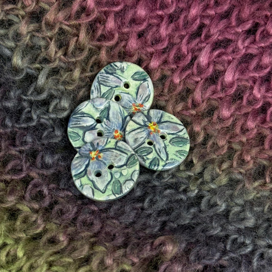Small Purple Flowers on Green Round Buttons