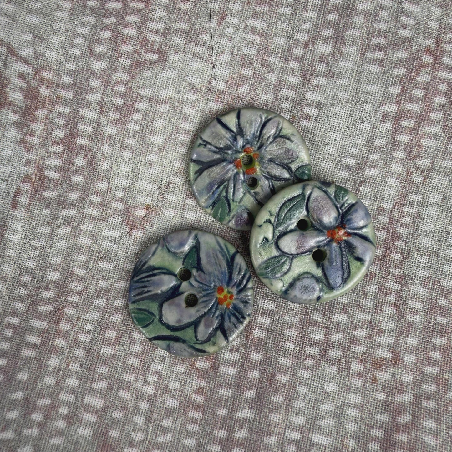 Small Purple Flowers on Green Round Buttons