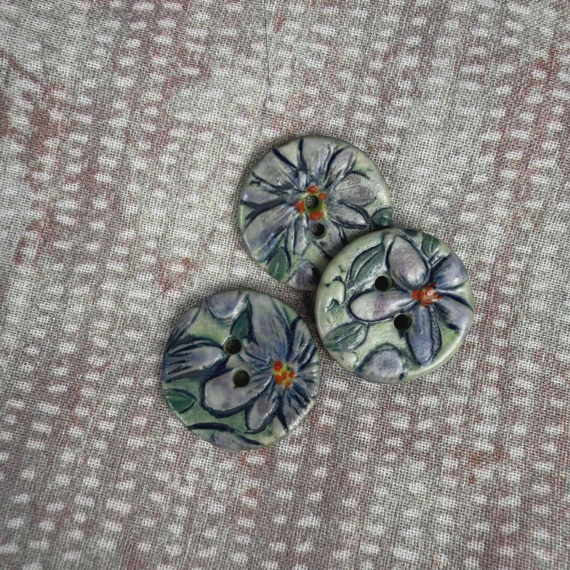 Small Purple Flowers on Green Round Buttons