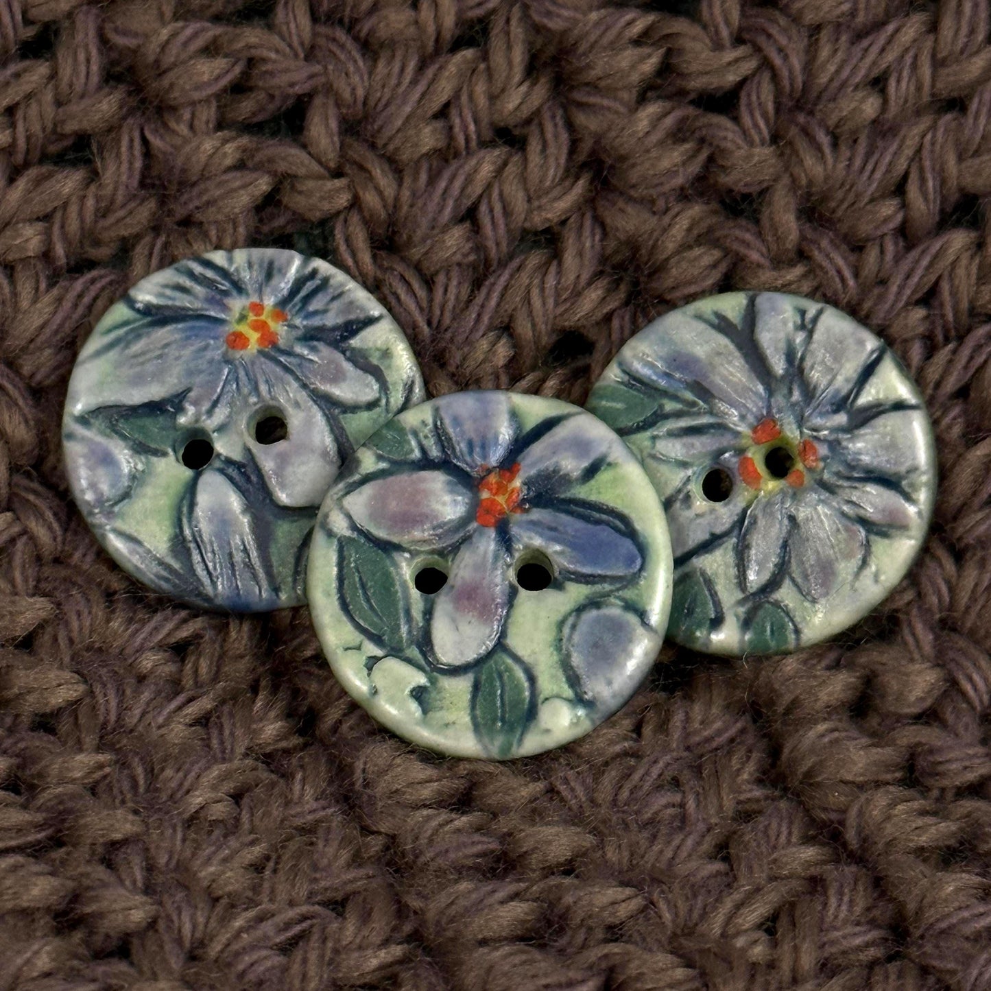 Small Purple Flowers on Green Round Buttons