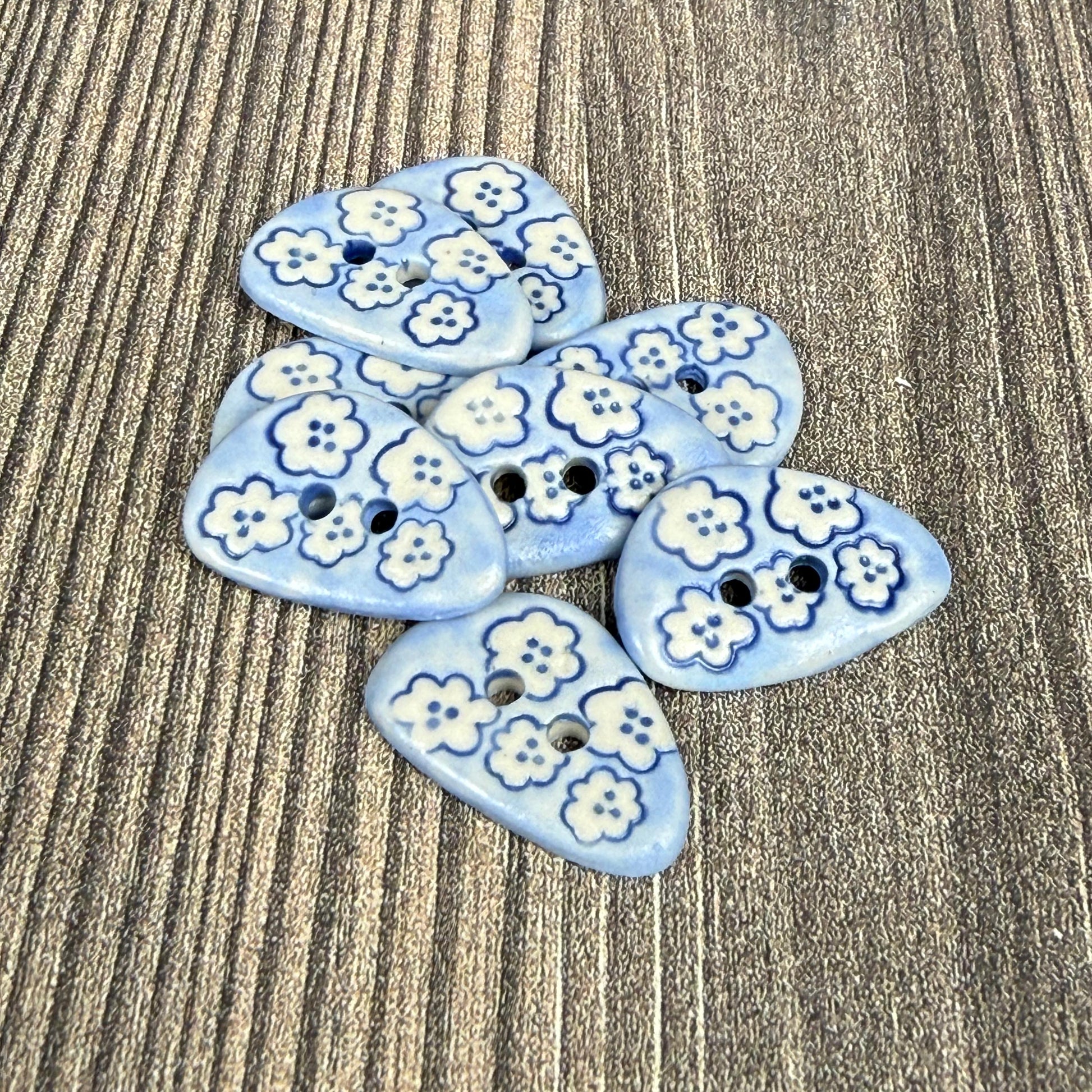 Set of 5 Small Blue Triangular Shaped Buttons with White Flowers