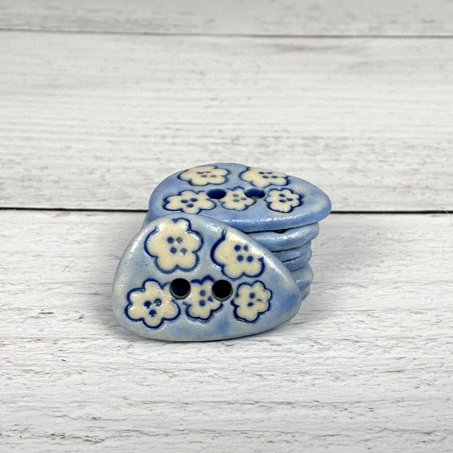 Set of 5 Small Blue Triangular Shaped Buttons with White Flowers