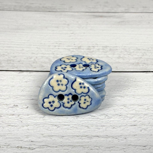 Set of 5 Small Blue Triangular Shaped Buttons with White Flowers