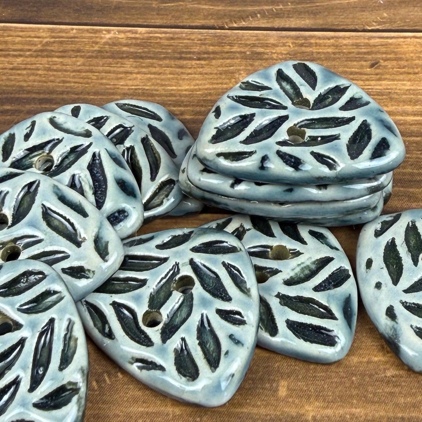 Triangular Shaped Buttons in Light Sage with Dark Sage Leaf Pattern