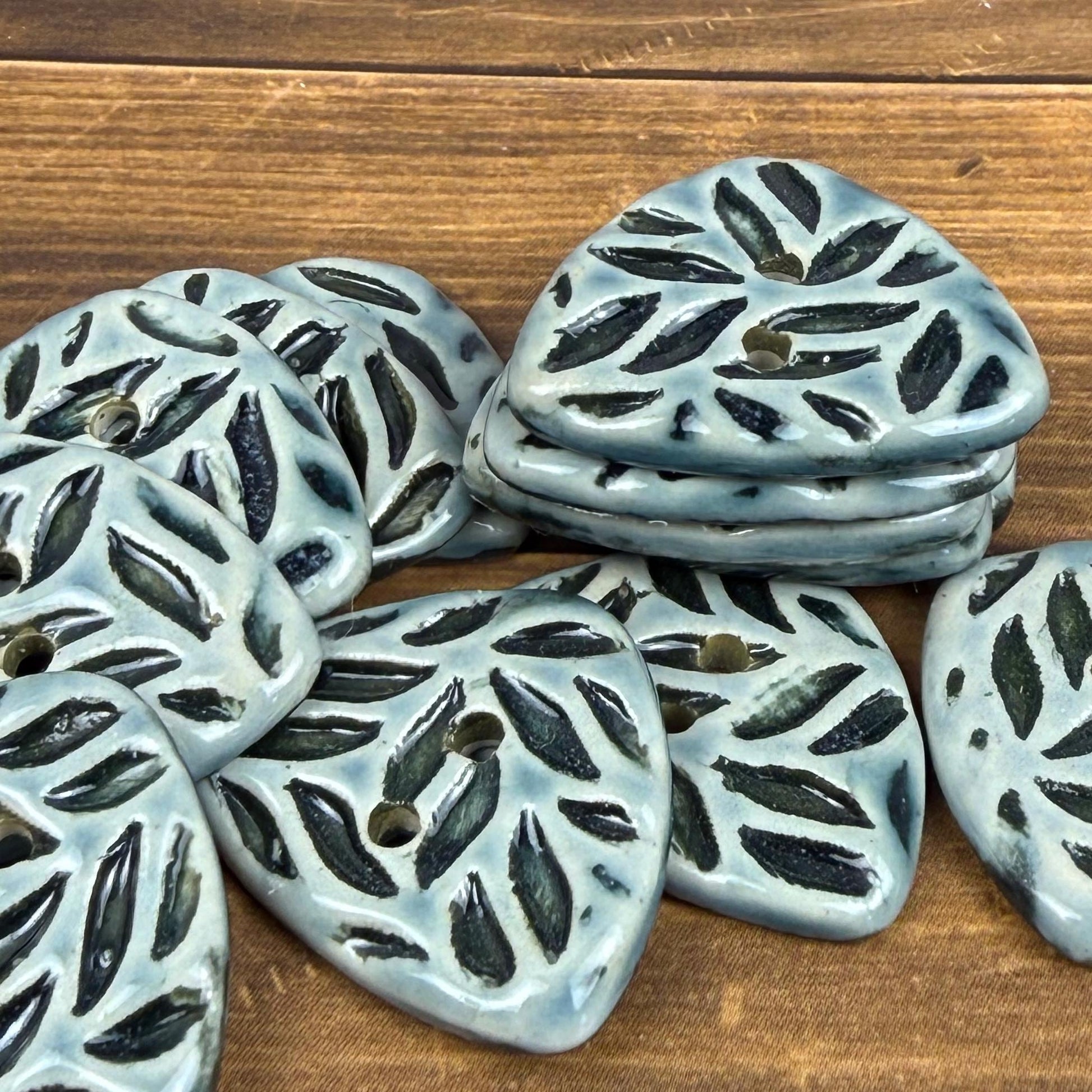 Triangular Shaped Buttons in Light Sage with Dark Sage Leaf Pattern