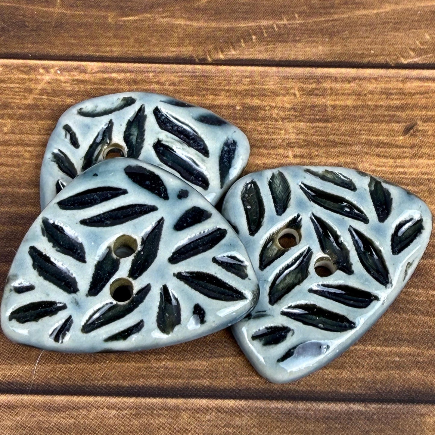 Triangular Shaped Buttons in Light Sage with Dark Sage Leaf Pattern