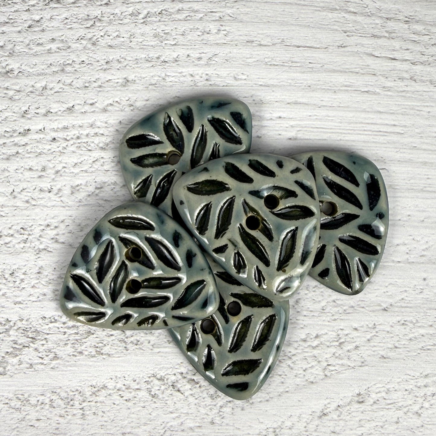 Triangular Shaped Buttons in Light Sage with Dark Sage Leaf Pattern