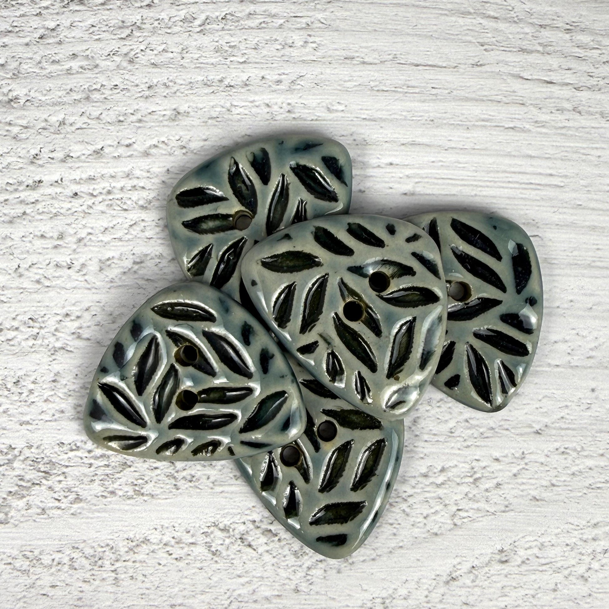 Triangular Shaped Buttons in Light Sage with Dark Sage Leaf Pattern