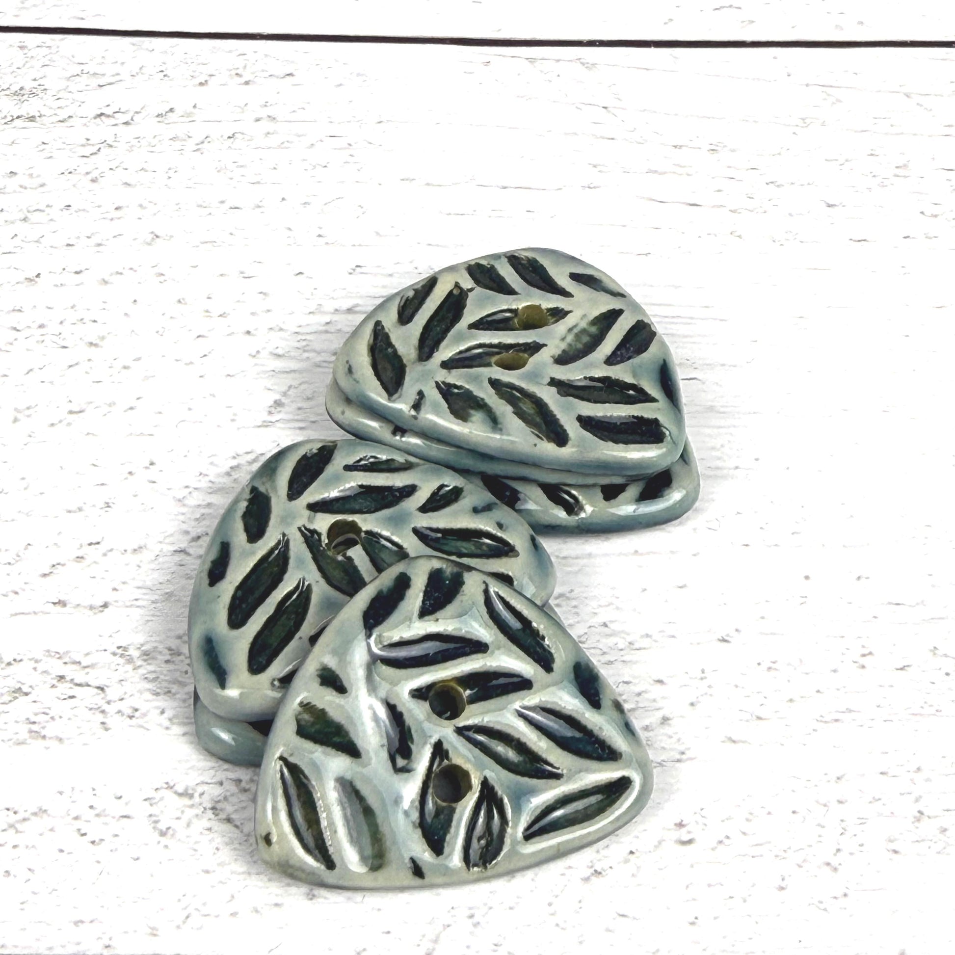 Triangular Shaped Buttons in Light Sage with Dark Sage Leaf Pattern