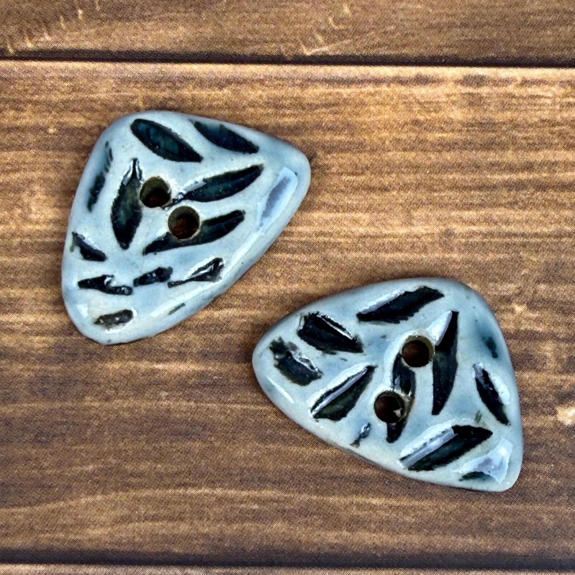 Small Triangular Shaped Buttons in Light Sage with Dark Sage Leaf Pattern