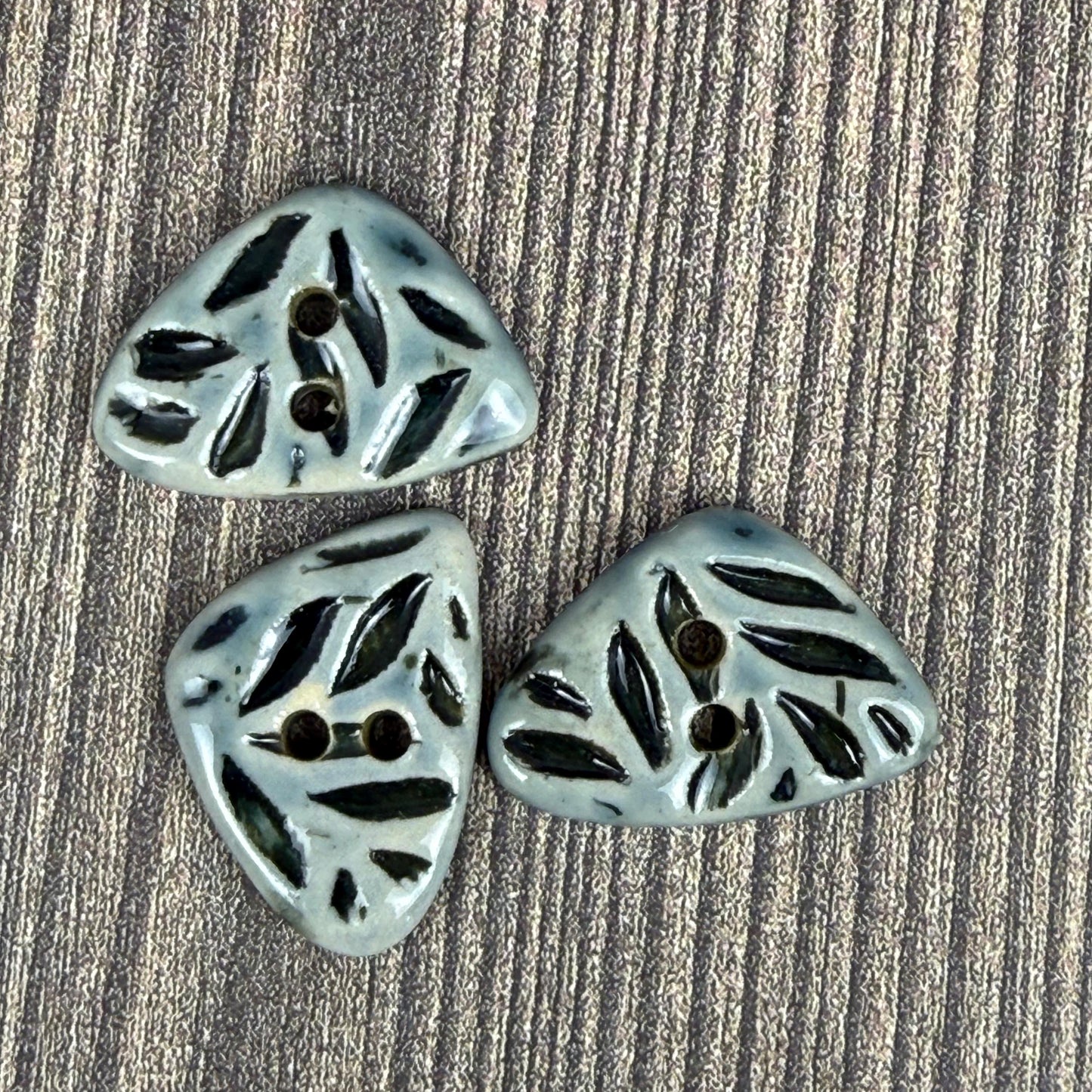 Small Triangular Shaped Buttons in Light Sage with Dark Sage Leaf Pattern