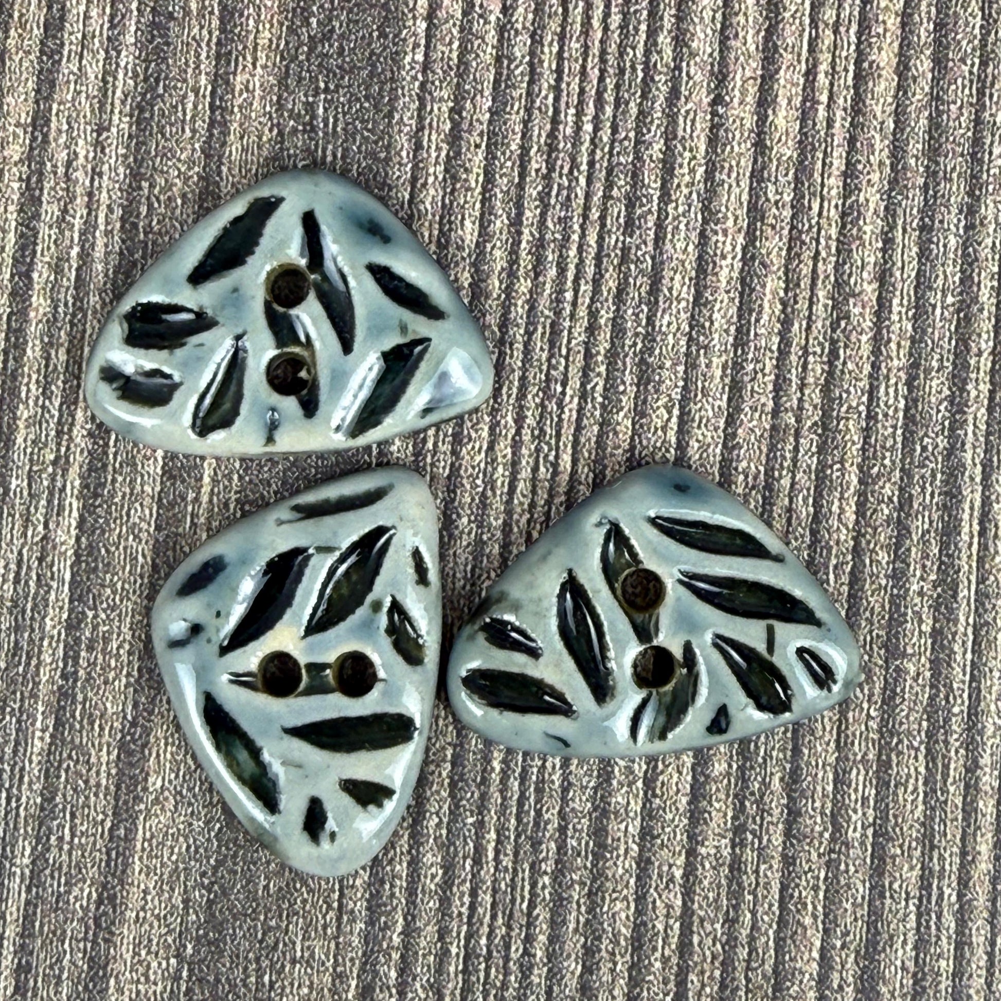 Small Triangular Shaped Buttons in Light Sage with Dark Sage Leaf Pattern