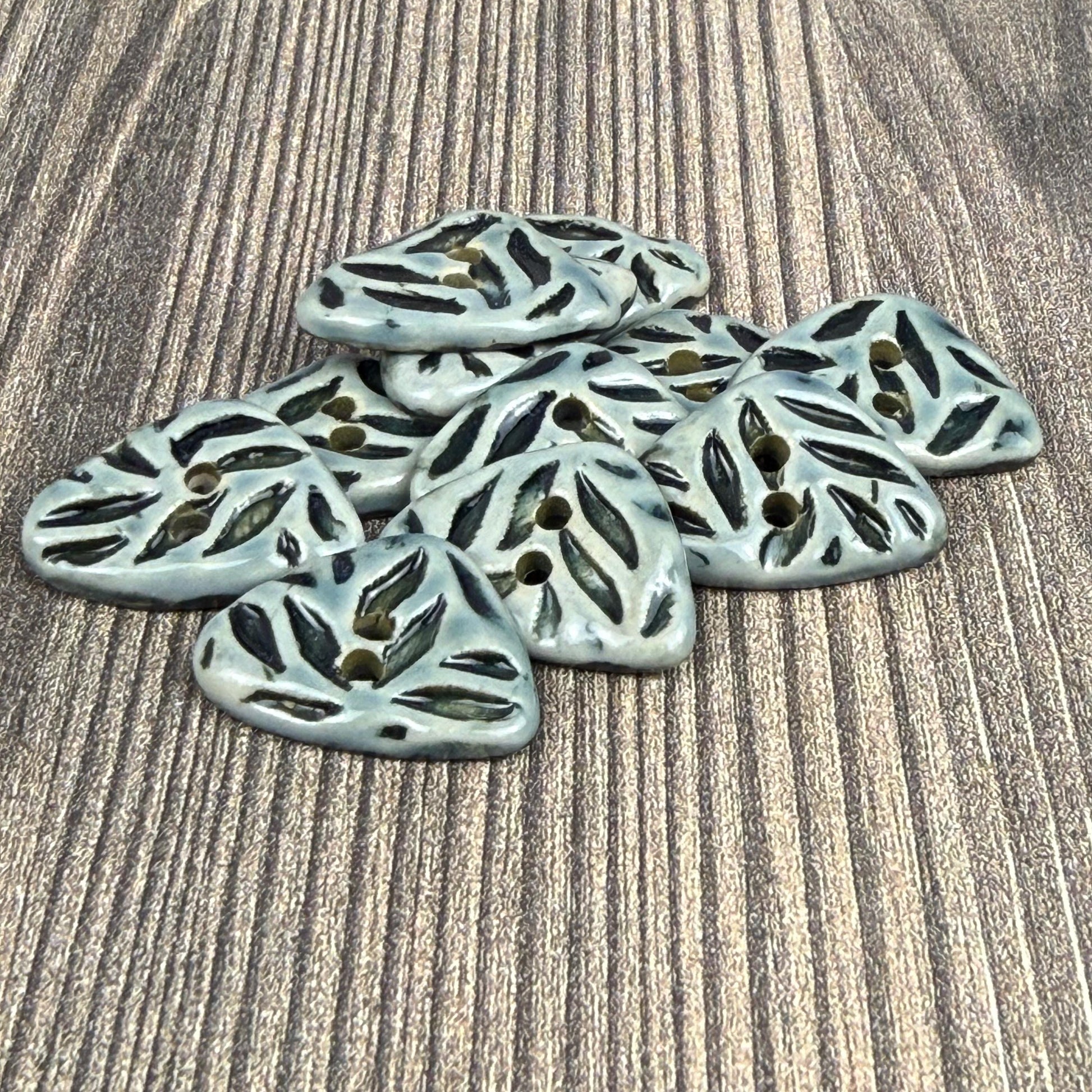 Small Triangular Shaped Buttons in Light Sage with Dark Sage Leaf Pattern