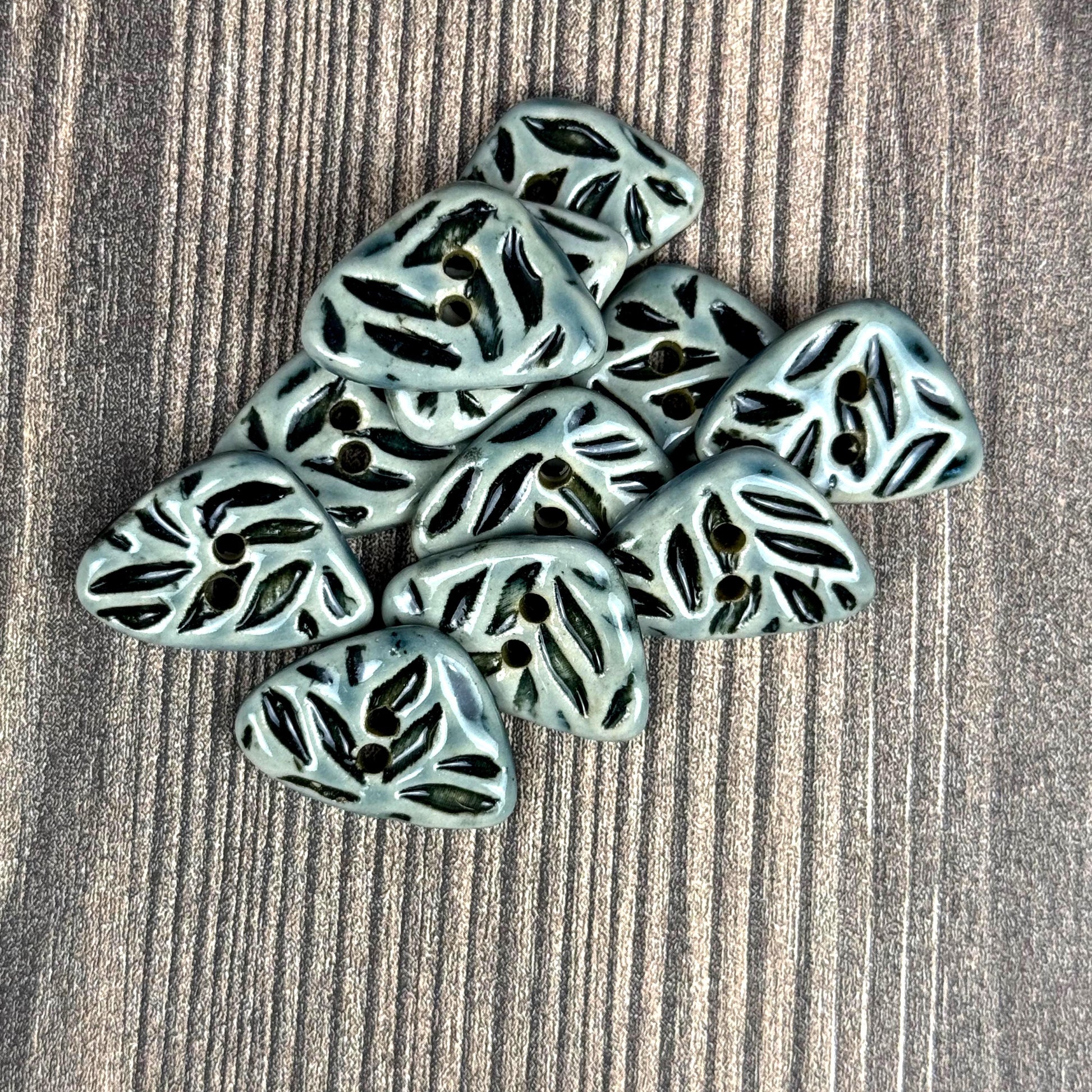 Small Triangular Shaped Buttons in Light Sage with Dark Sage Leaf Pattern