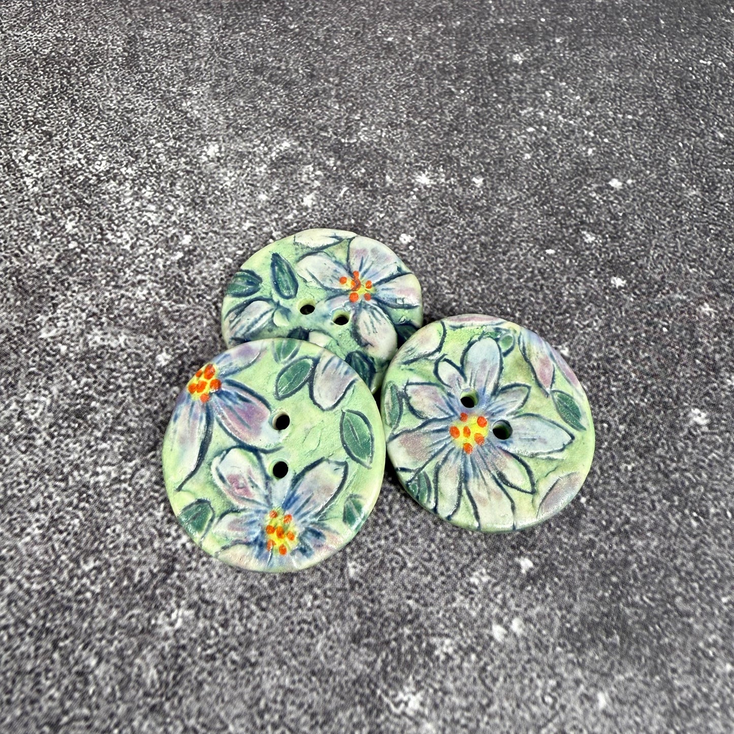 Purple Flowers on Green Round Buttons