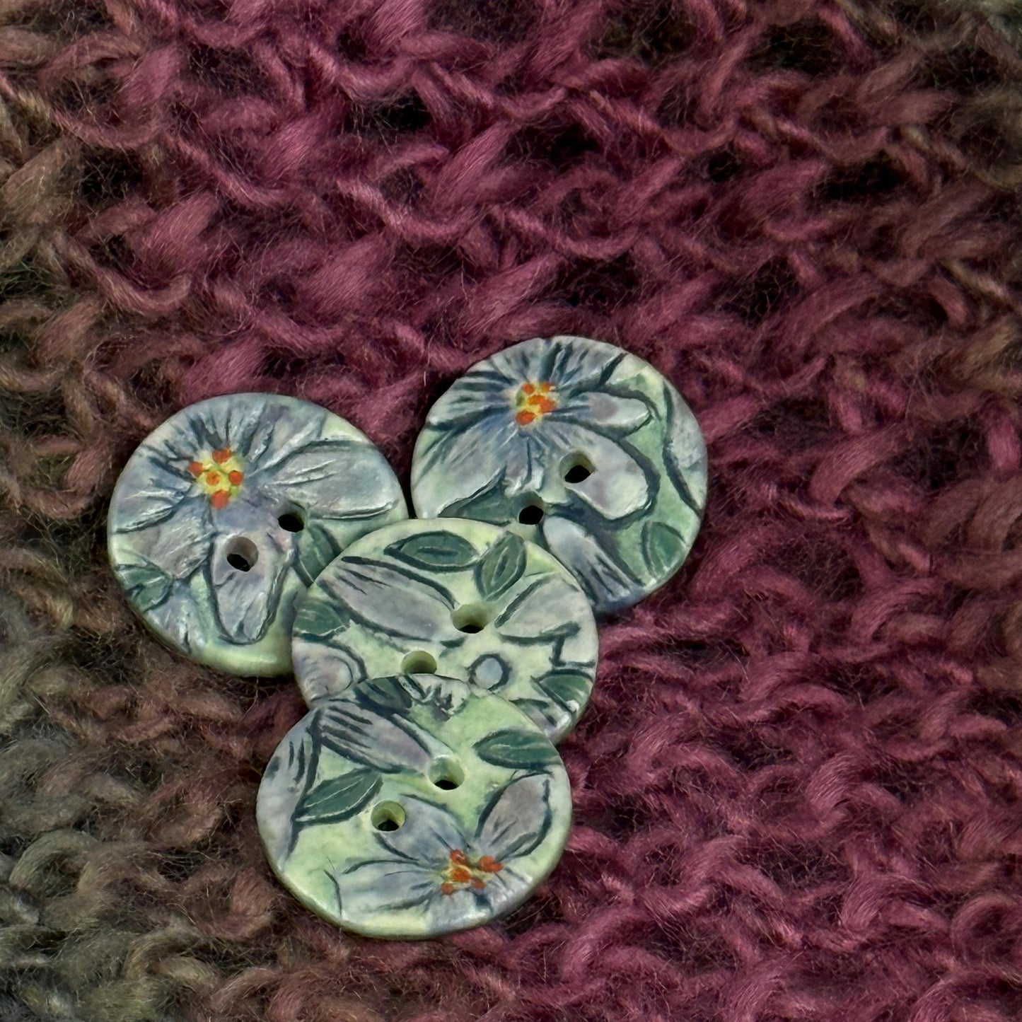 Small Purple Flowers on Green Round Buttons