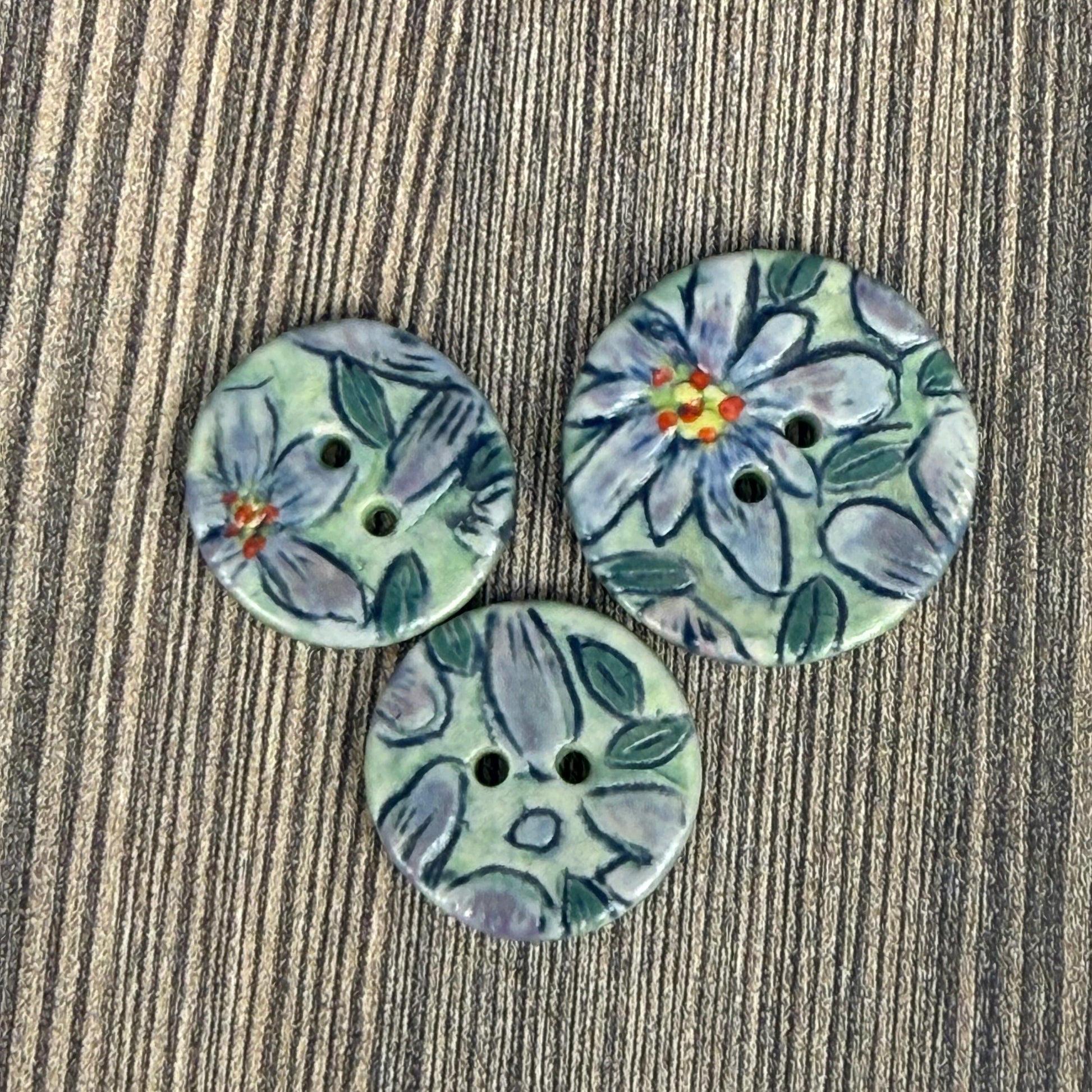 Small Purple Flowers on Green Round Buttons