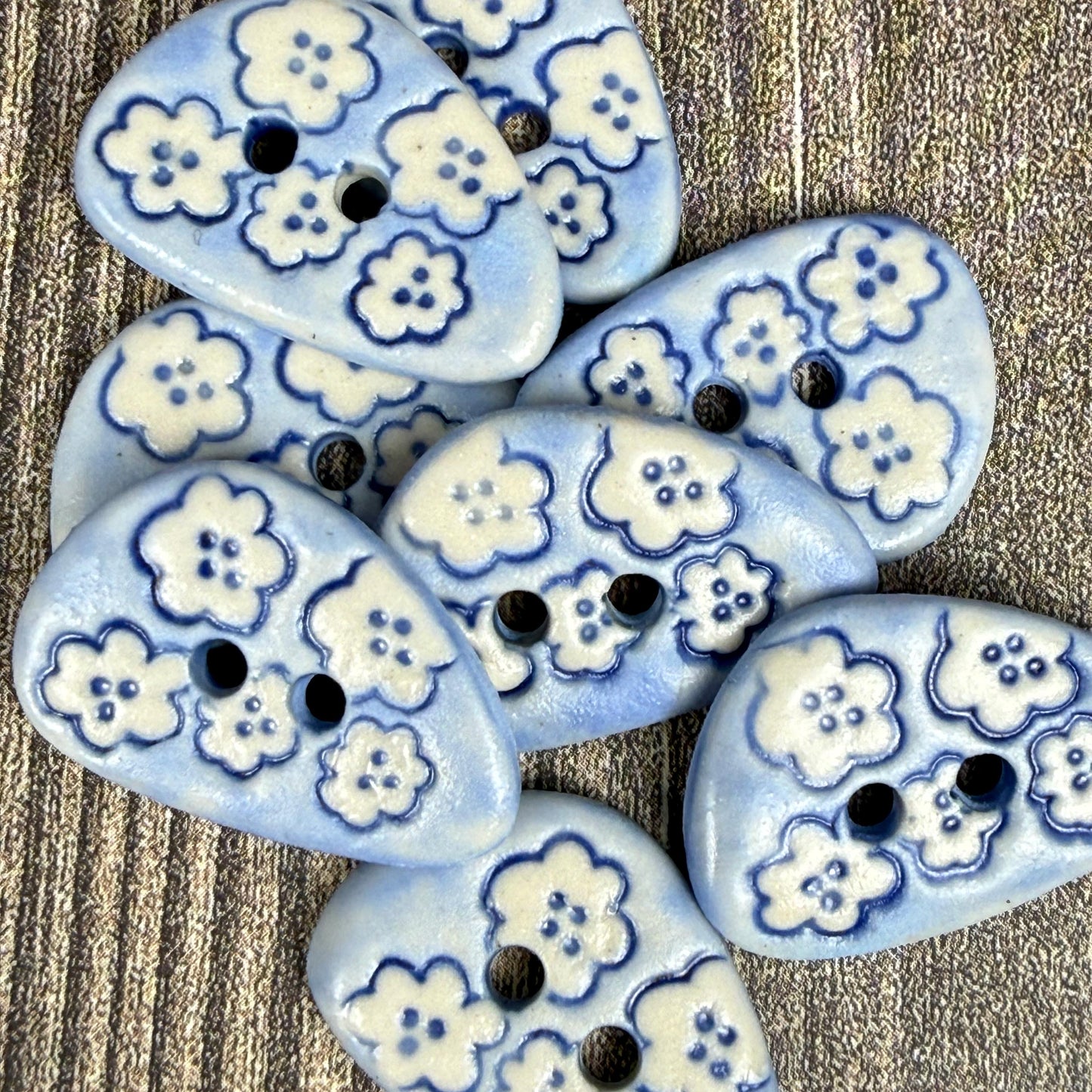 Set of 5 Small Blue Triangular Shaped Buttons with White Flowers