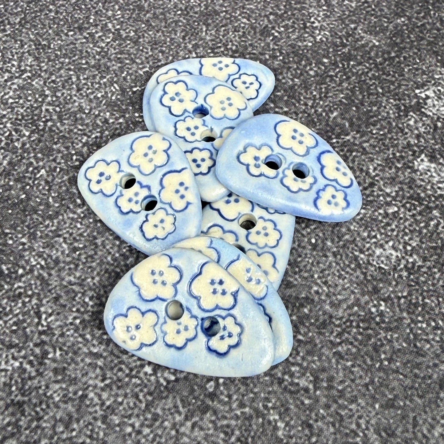 Set of 5 Small Blue Triangular Shaped Buttons with White Flowers