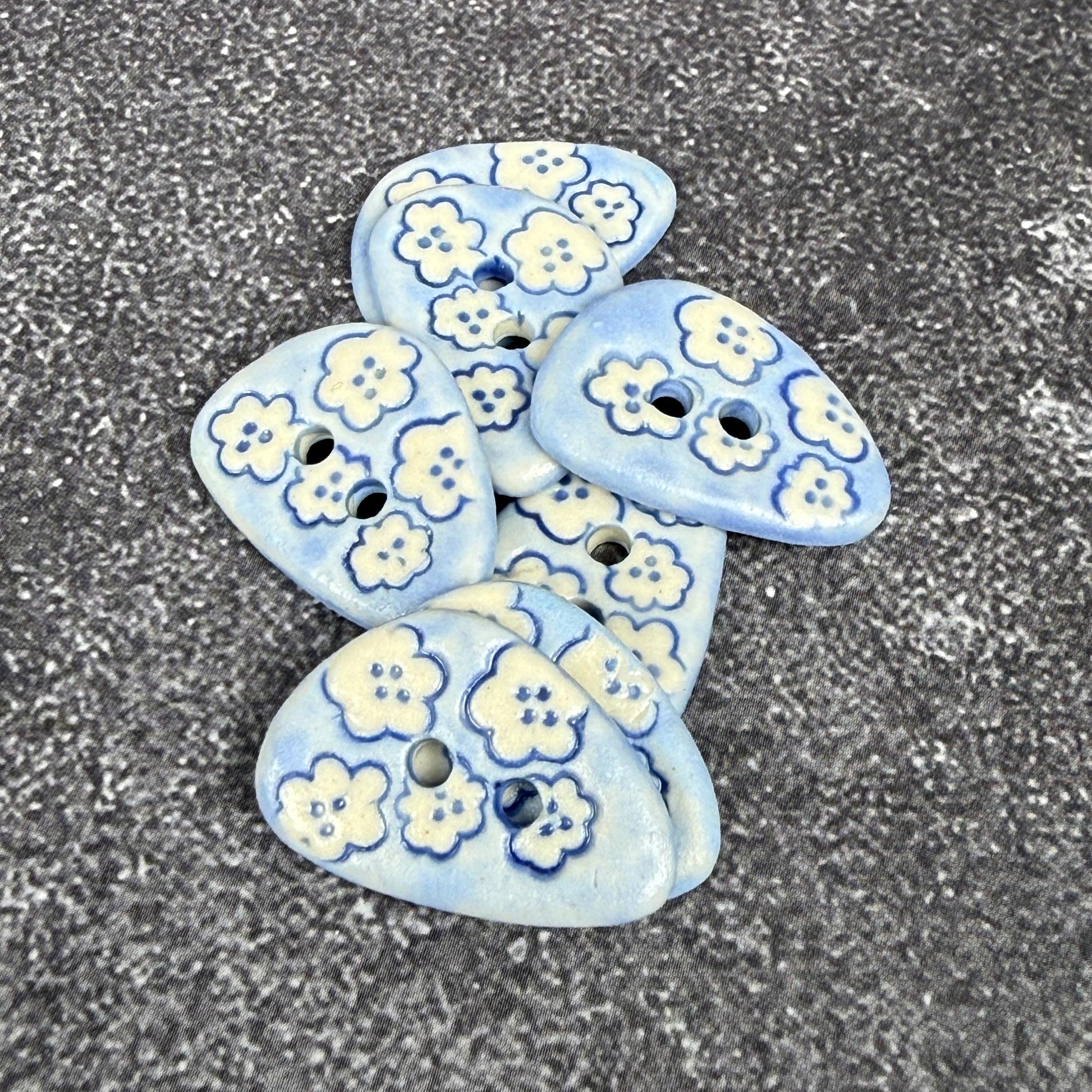 Set of 5 Small Blue Triangular Shaped Buttons with White Flowers