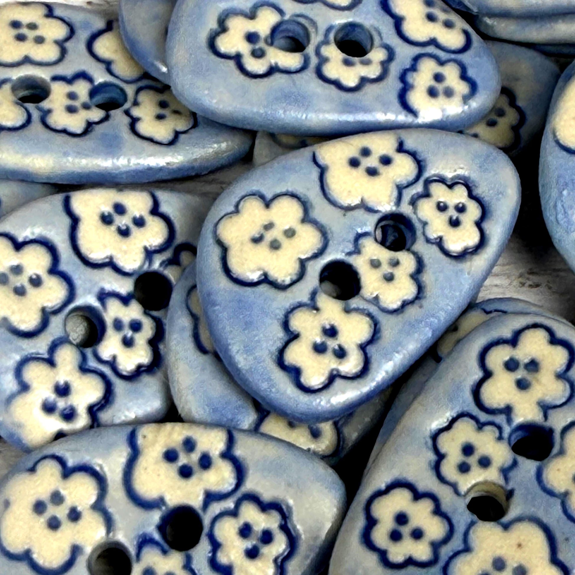 Set of 5 Small Blue Triangular Shaped Buttons with White Flowers