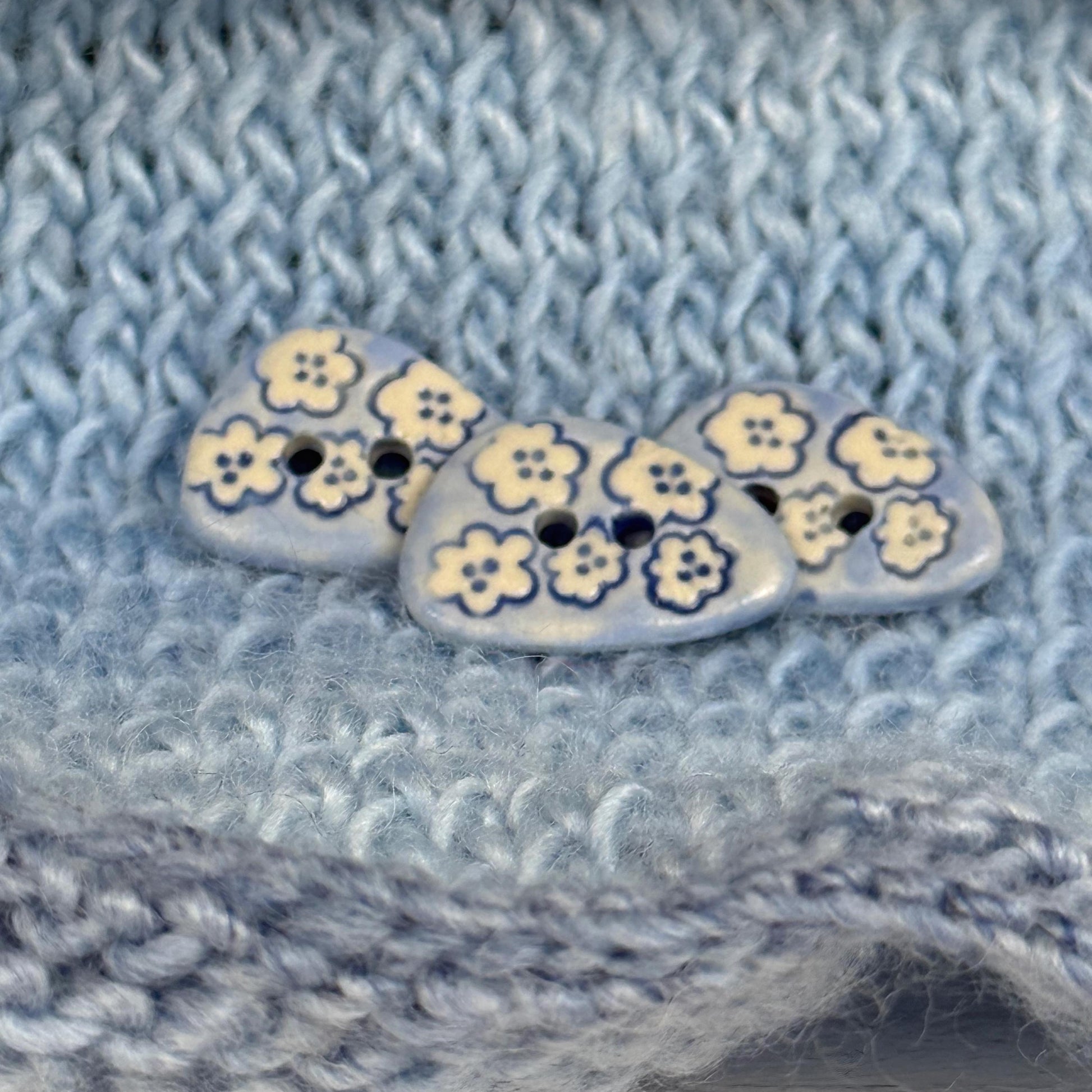Set of 5 Small Blue Triangular Shaped Buttons with White Flowers