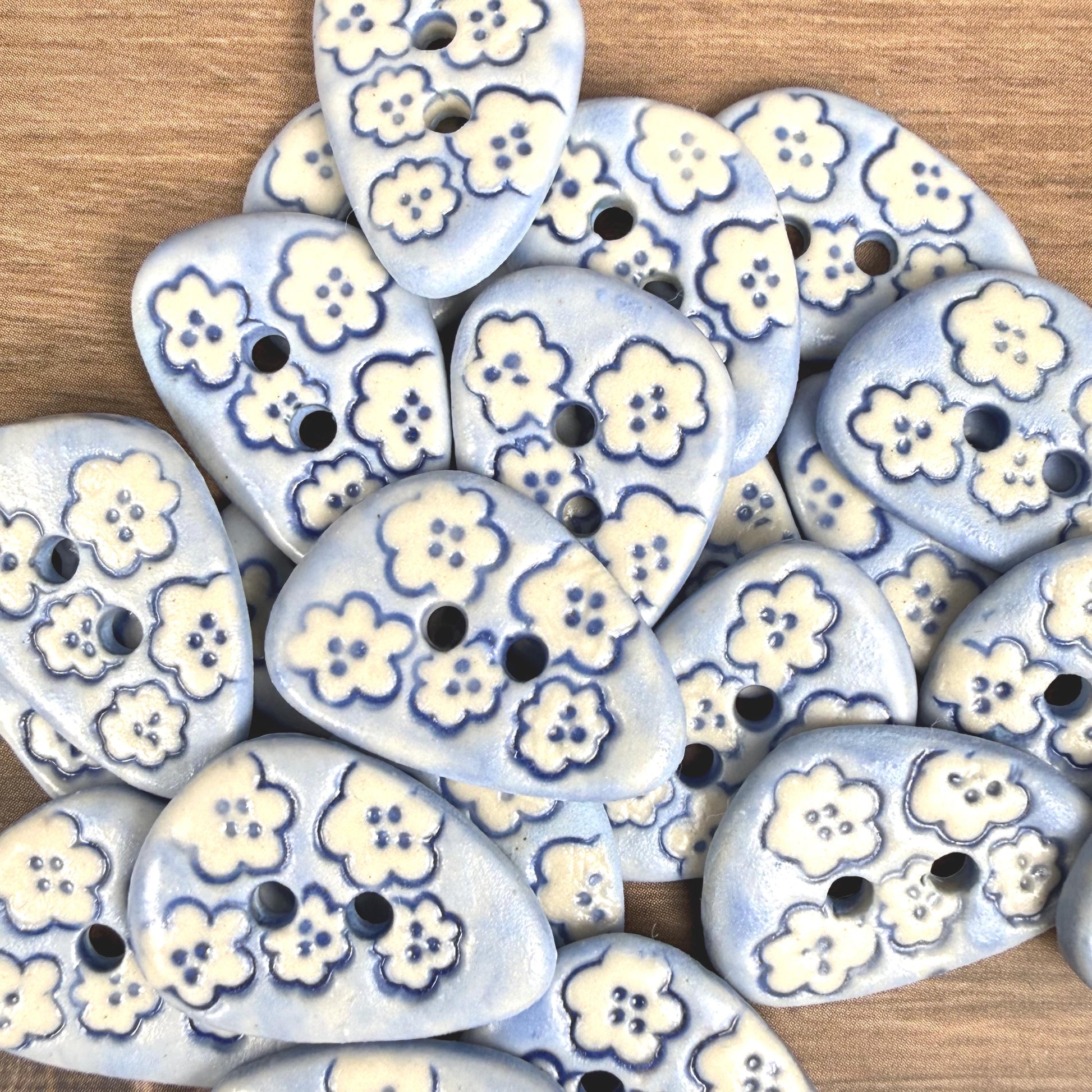 Set of 5 Small Blue Triangular Shaped Buttons with White Flowers